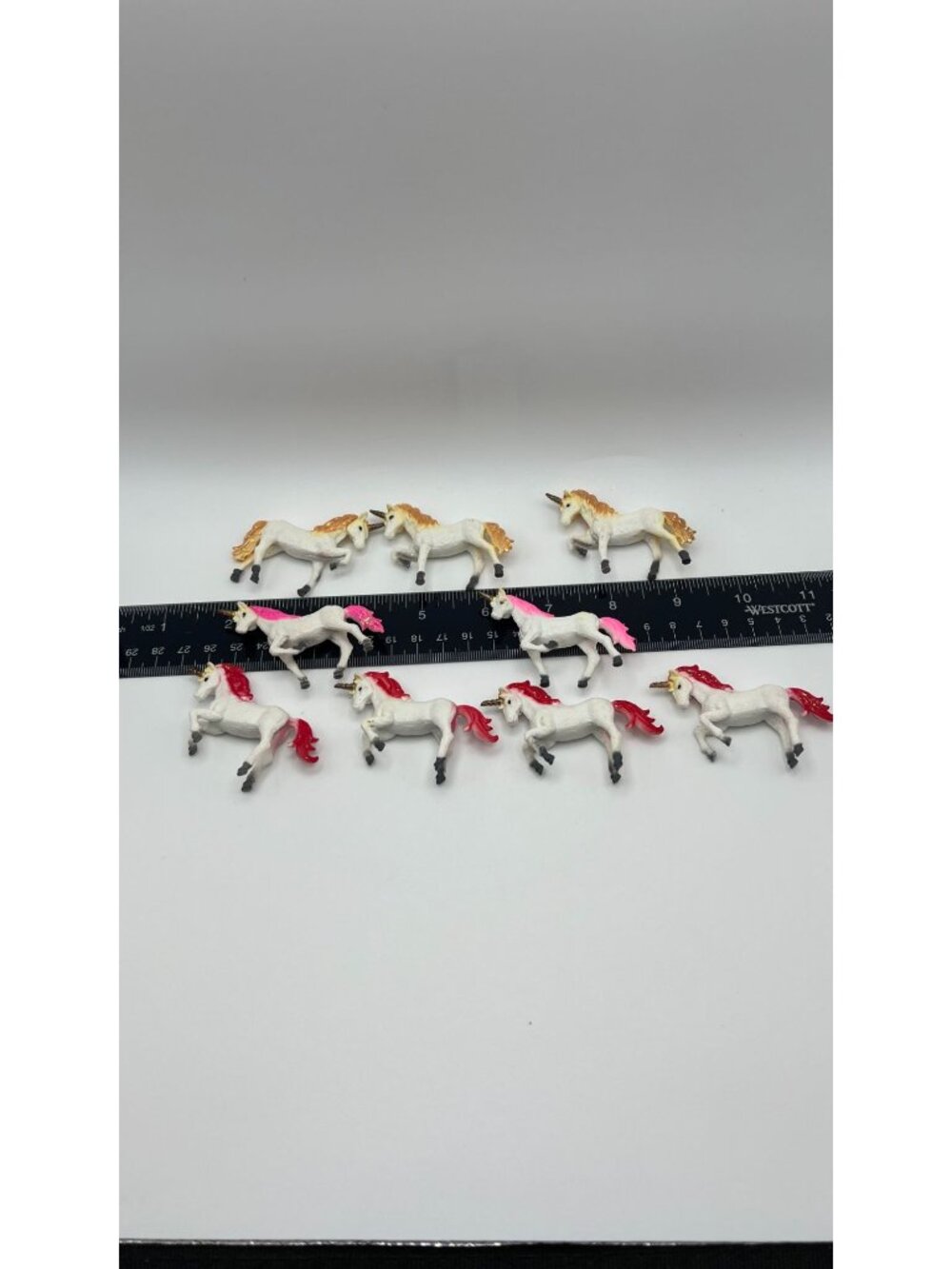 Set Of 9 Miniature Unicorn Figurines With Glitter Accents In Red Pink & Gold Man